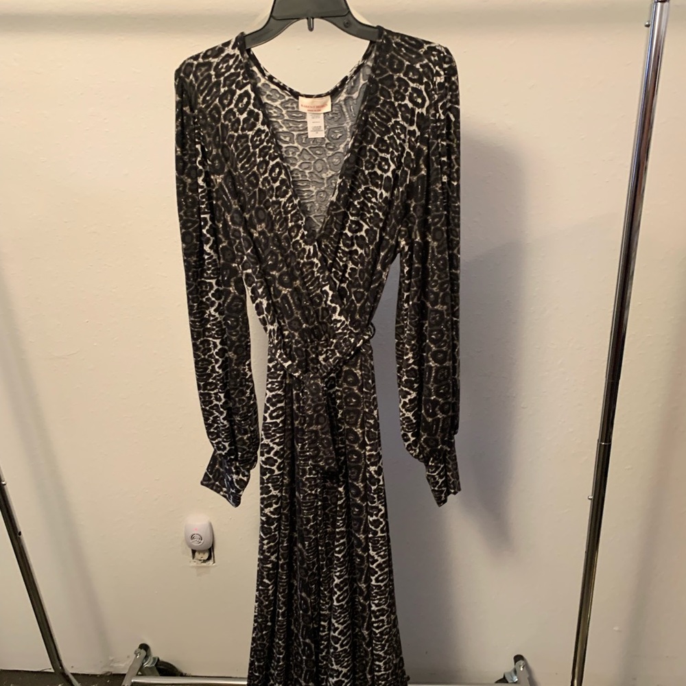 New without tags, Leopard jumpsuit, size XL, smoke and pet free home